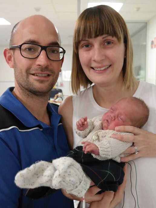 Joanne and Scott Beedie with Lewis, proudly wearing his first Scottish kilt.